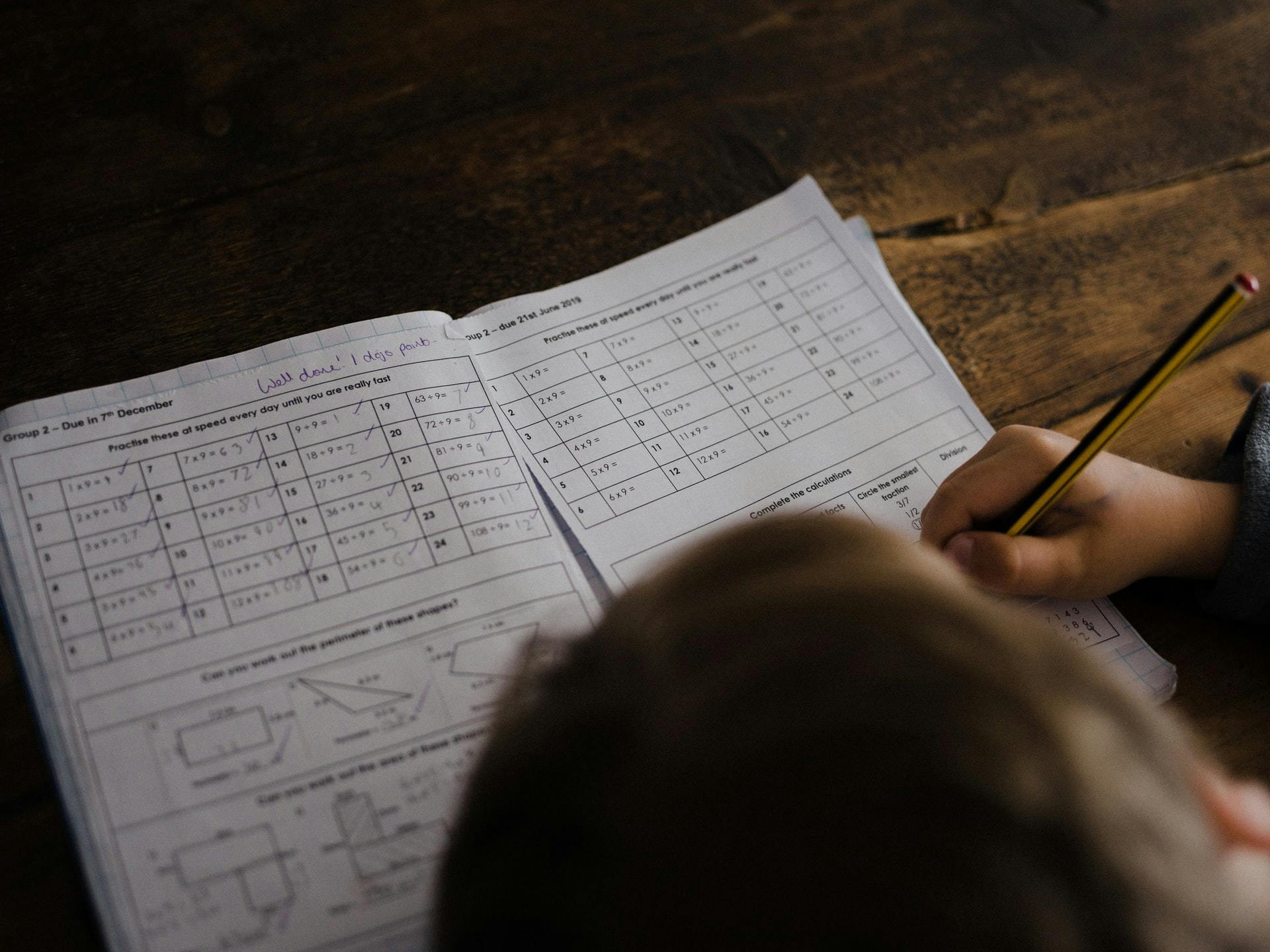 Student completes a math worksheet.