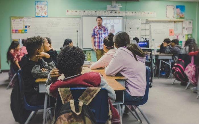 School math class being led by a math teacher.