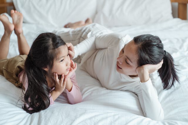 A mother and her daughter talking