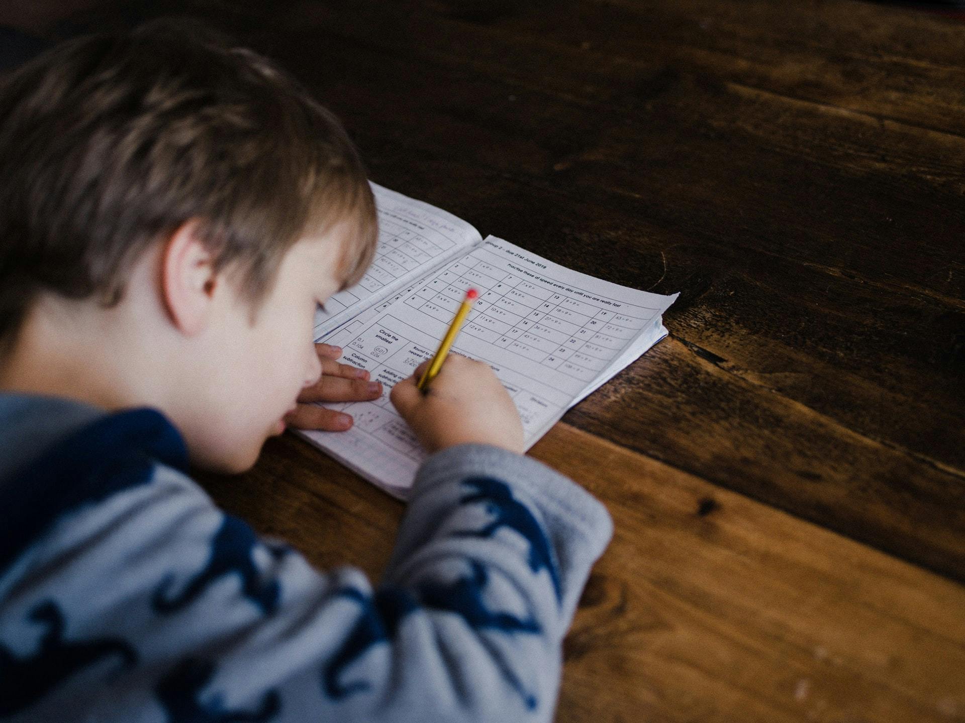 child doing math work