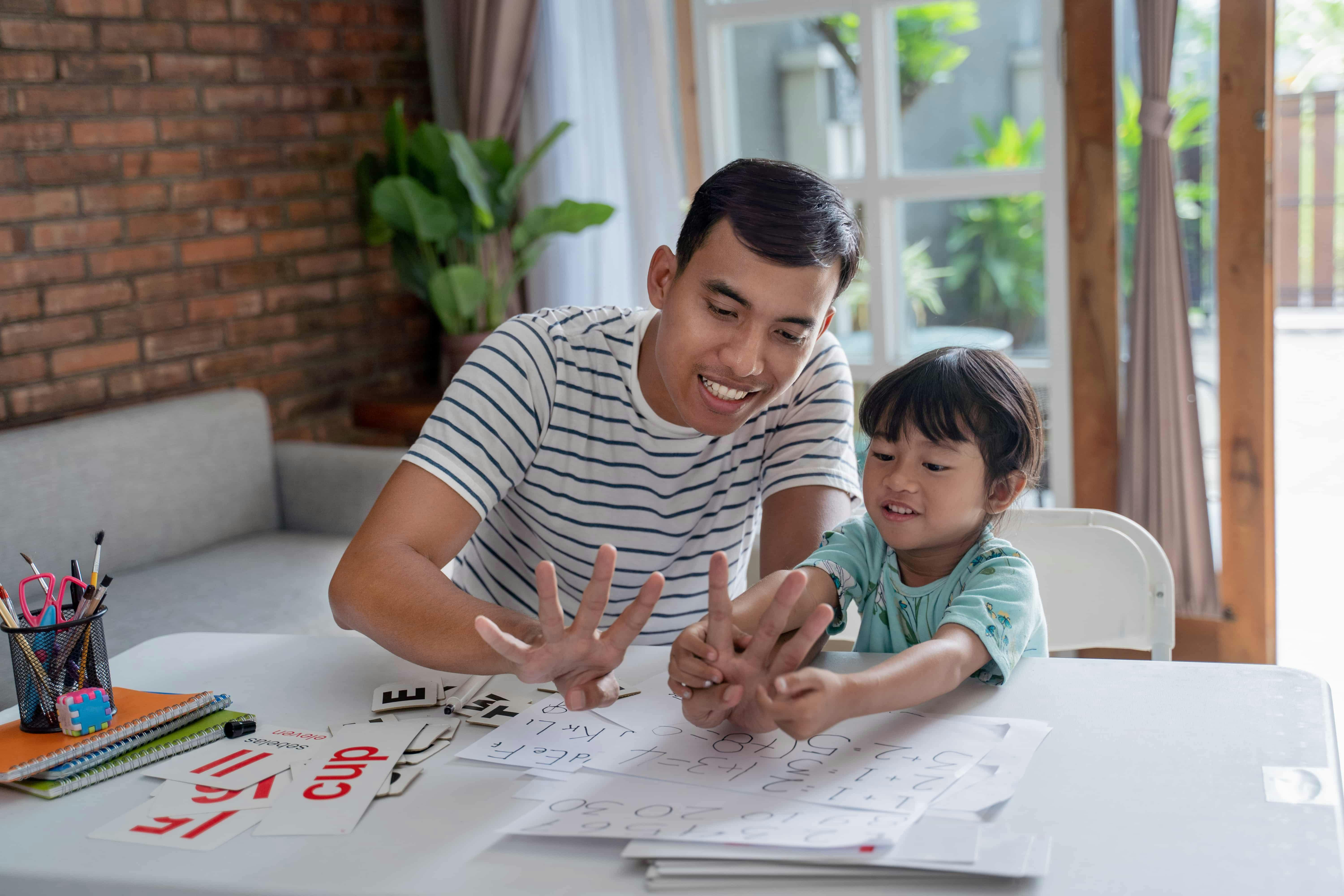 Parent using new math methods with his child.