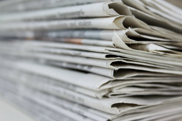 Stack of newspapers.